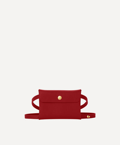 LA PETITE ENVELOPPE CUIR CARMIN AVEC BANDOULIÈRE