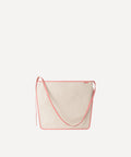 Le sac Postier L/UNIFORM en toile Quadrille naturelle et en cuir rose vue de face