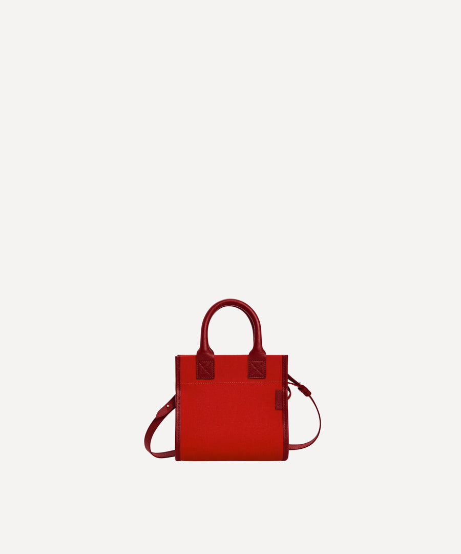 LE MINI SAC À COMMISSIONS ROUGE