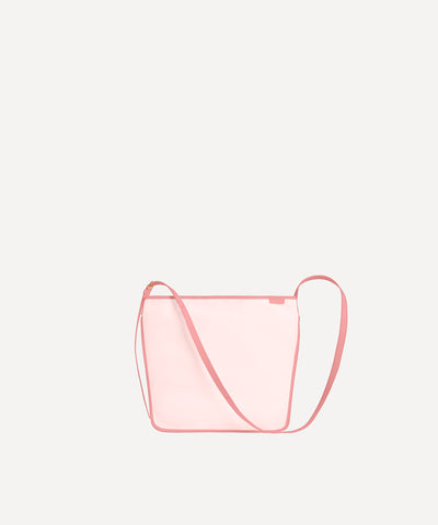 Sac le Petit Postier L/UNIFORM en toile rose et en cuir rose vue de face