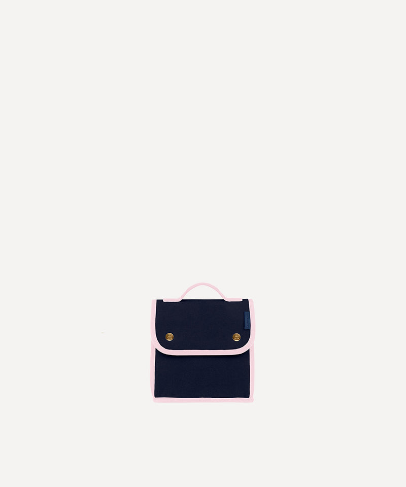 Le Sac à Goûter L/UNIFORM en toile marine et rose vue de face